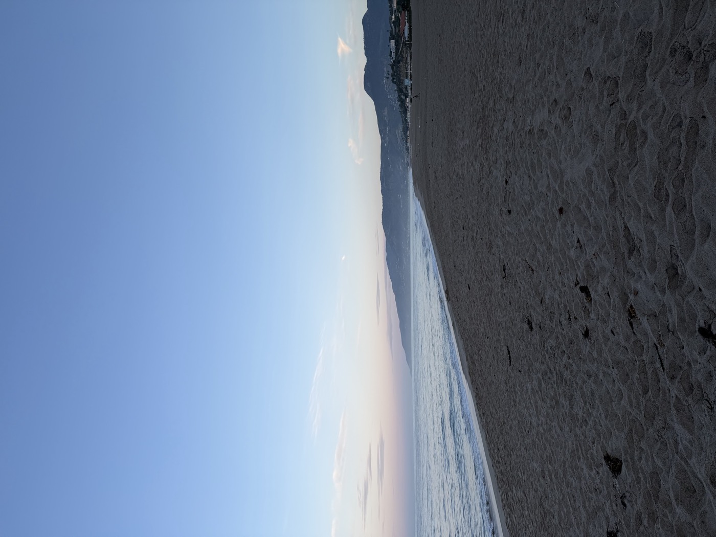 Empty beach at dusk in Malibu, California
