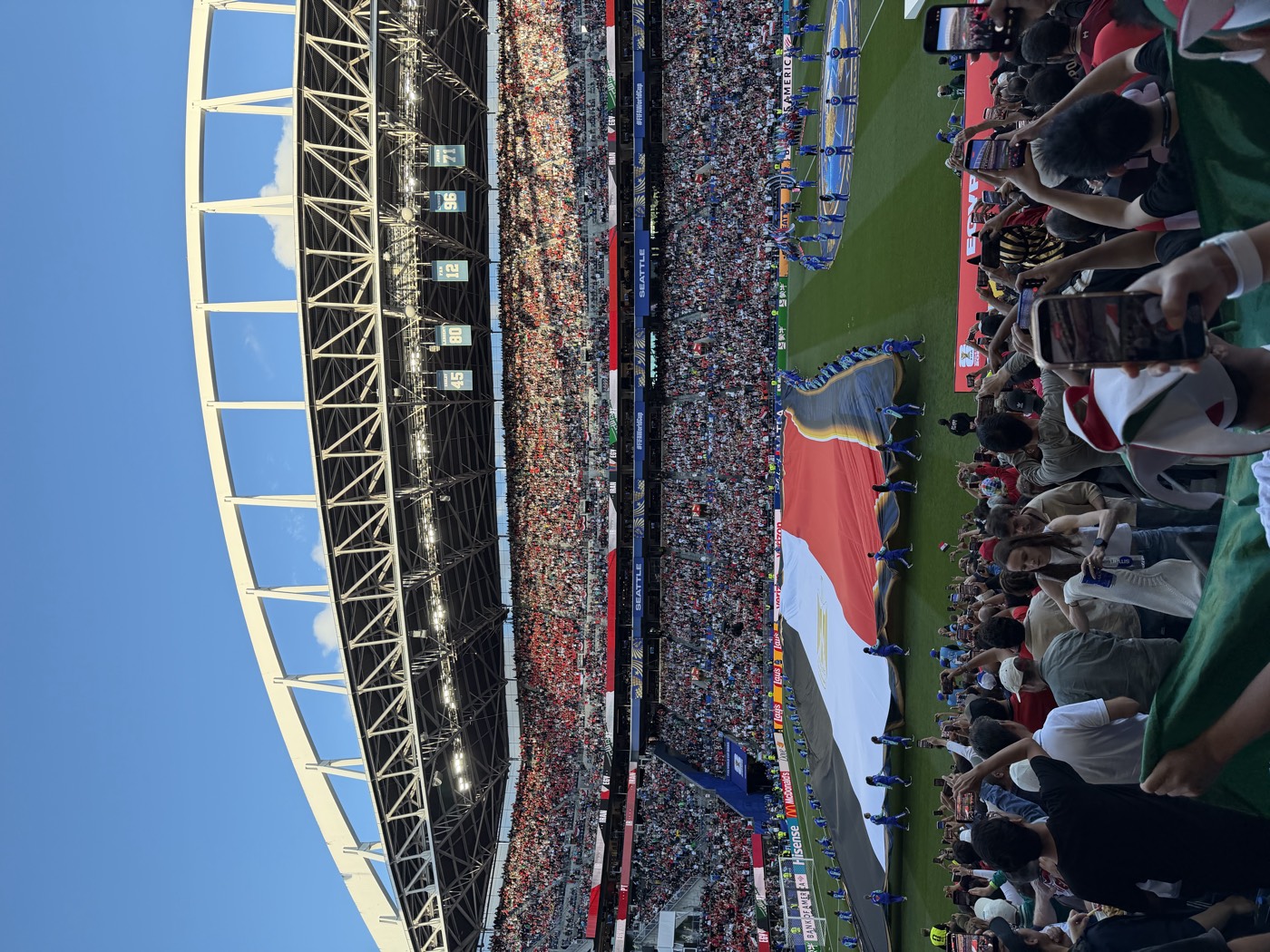 Opening ceremony flags on the pitch at a World Cup match in Seattle