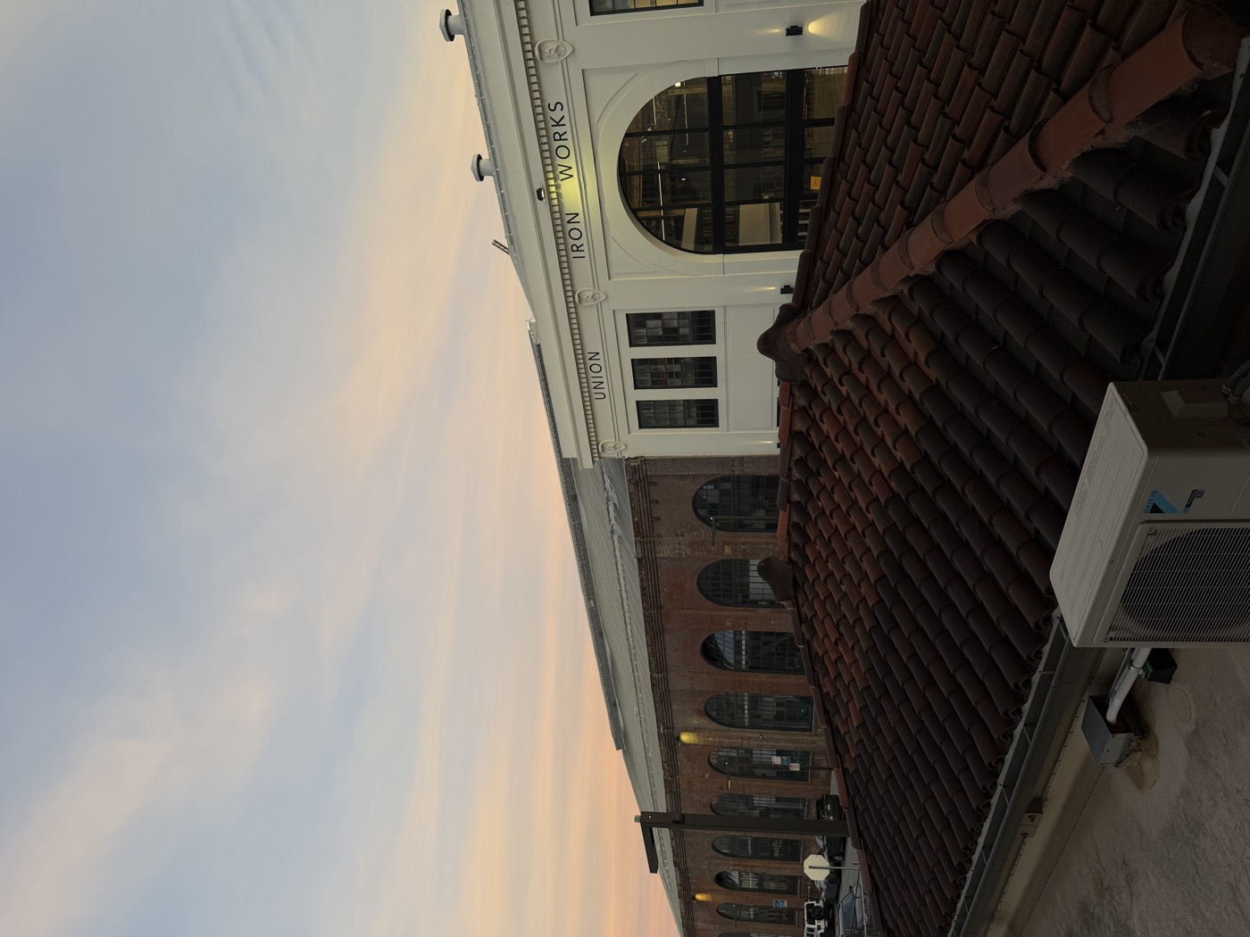 Sunset over the Union Iron Works building at Y Combinator HQ in San Francisco